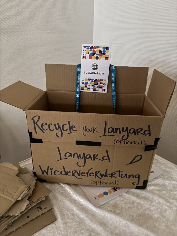 A box  on a table to collect and recycle the lanyards after the conference
