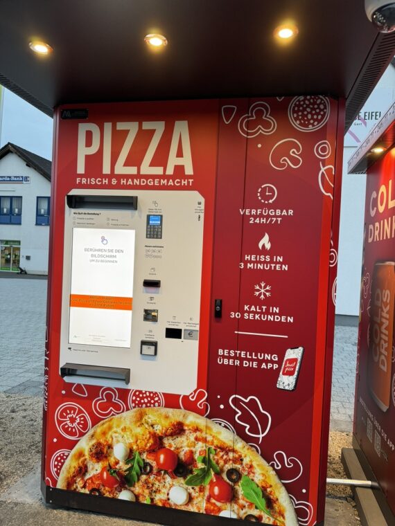 a picture of a red pizza machine
